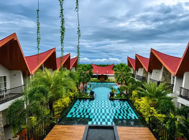 Elevated view of the pool and villas